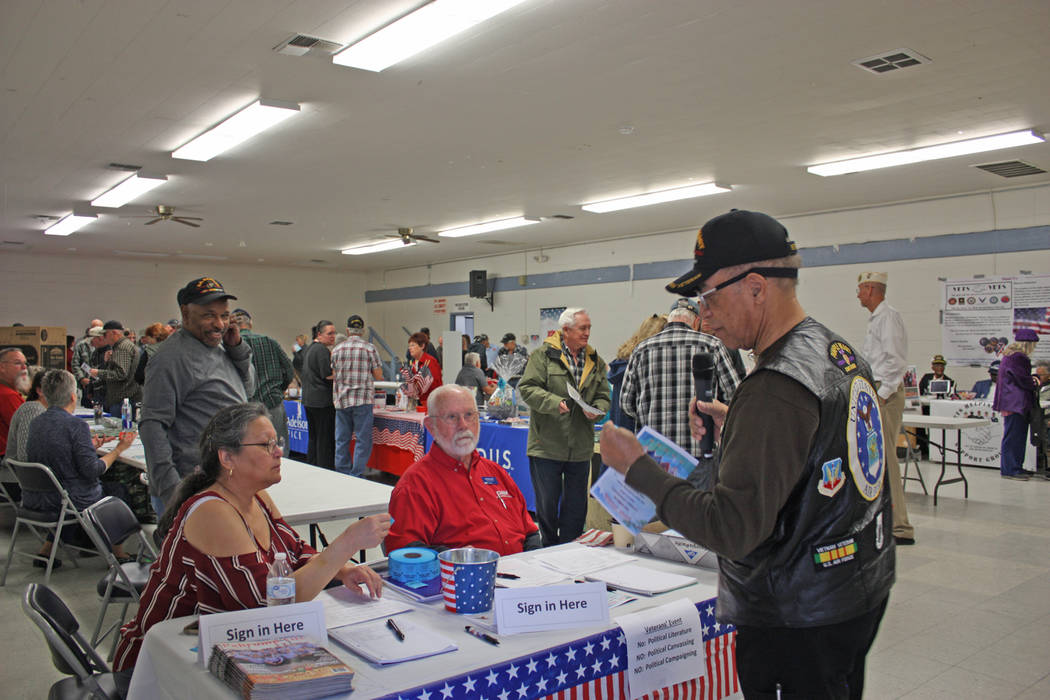 Robin Hebrock/Pahrump Valley Times Veterans Extravaganza volunteers and organizers are shown at the sign-in booth, where veteran attendees were each handed a ticket for free ice cream as well as t ...