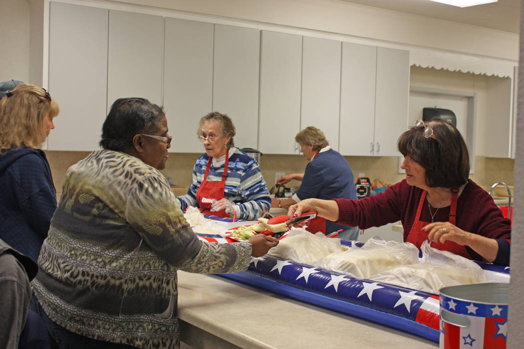 Robin Hebrock/Pahrump Valley Times The Disabled American Veterans Auxiliary prepared a luncheon for Veterans Extravaganza attendees to enjoy, including fruit and sandwiches which attendees were ob ...