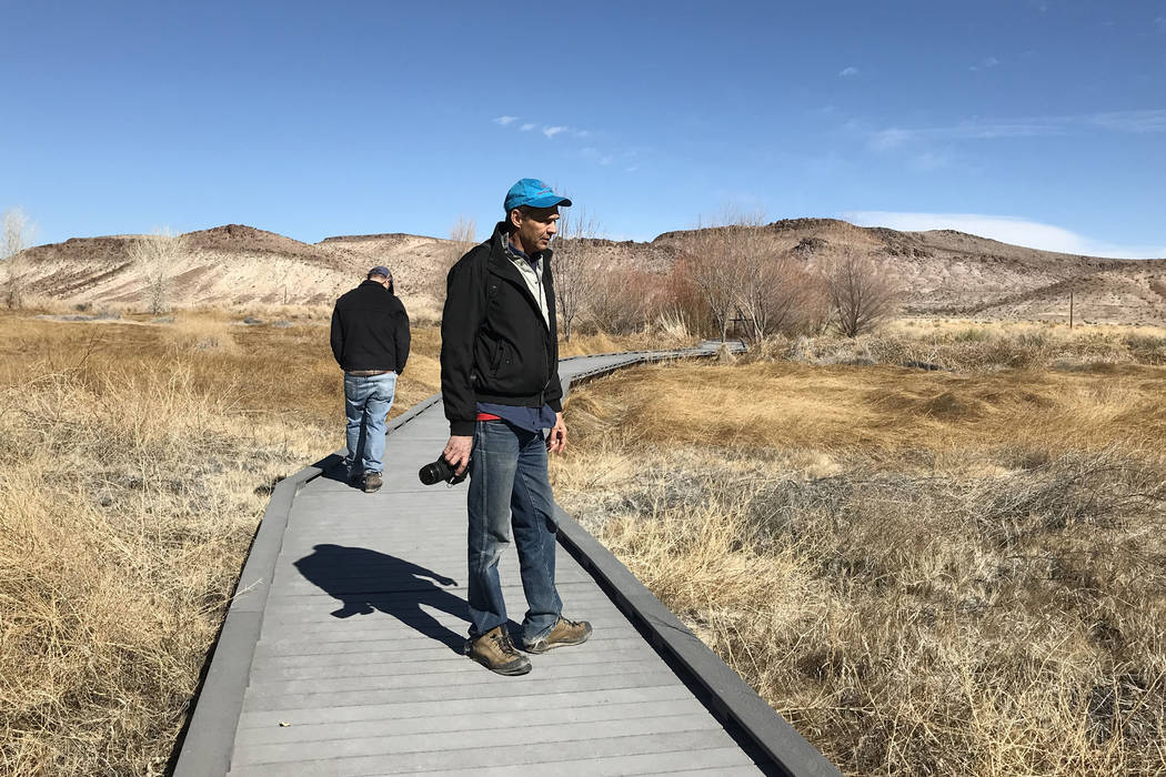 Len Warren, right, and John Zablocki from the The Nature Conservancy stand on the boardwalk at the Torrance Ranch Preserve north of Beatty on Feb. 8, 2019. Henry Brean Las Vegas Review-Journal