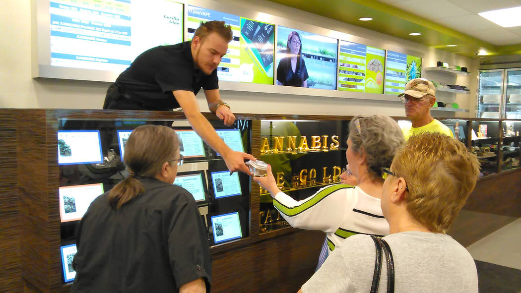 Selwyn Harris/Pahrump Valley Times Grove dispensary Manager Zachary Wright provides information on the benefits of marijuana. Nye County's lone dispensary opened its doors to Pahrump residents thr ...