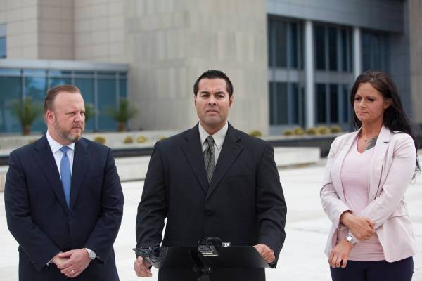 Gus Redding speaks to the media outside the federal court house in Las Vegas, Monday, March 11, 2019. Redding is a current employee at the Nevada National Security Site who alleges in a federal la ...