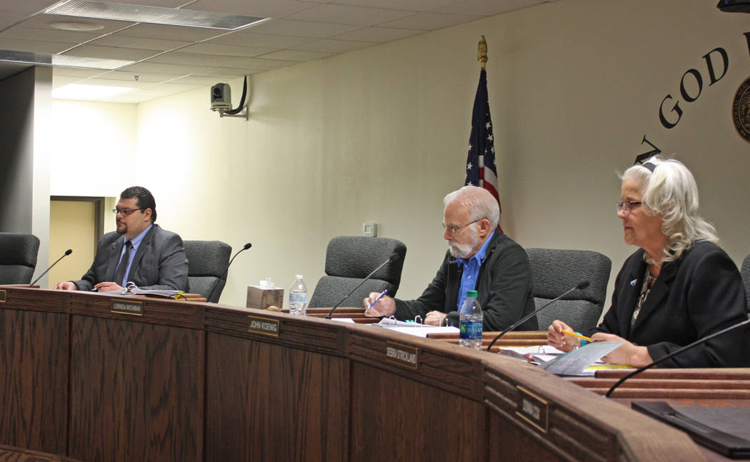 Robin Hebrock/Pahrump Valley Times Nye County Commissioners Leo Blundo, John Koenig and Debra Strickland are pictured at the county commission's March 11 meeting, where the board voted 5-0 to adop ...