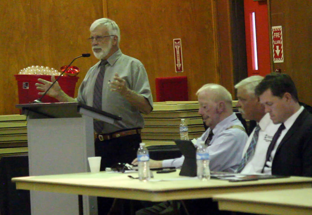 Jeffrey Meehan/Pahrump Valley Times Dave Hall (left), District 2 board of directors for Valley Electric Association, speaks during annual District 2 meeting in Amargosa Valley at 821 E. Amargosa ...