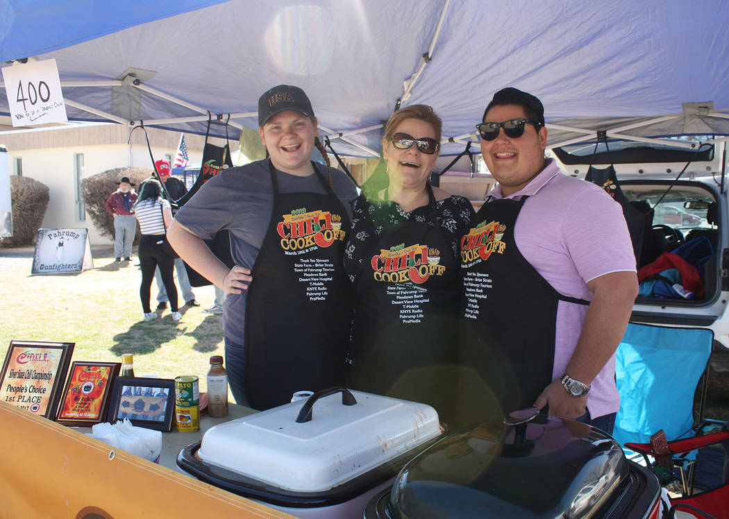 Robin Hebrock/Pahrump Valley Times Darbie O'Donnell, Deanna O'Donnell and Josh Westerman proudly pose for a photo on Saturday, March 16. Their team, Ours is Better Than Theirs Chili Company, took ...