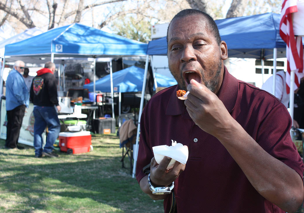 Robin Hebrock/Pahrump Valley Times With obvious enjoyment, a Silver State Chili Cook-off attendee digs into a tasting from the On the Road Chili, just one of the many chili teams competing in this ...