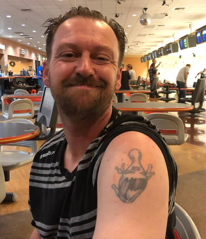 Tom Rysinski/Pahrump Valley Times Pahrump resident Anthony Matassa shows off the tattoo marking his first 300 game, which he rolled Jan. 20, 2002, his mother's birthday, when he was 16 years old.
