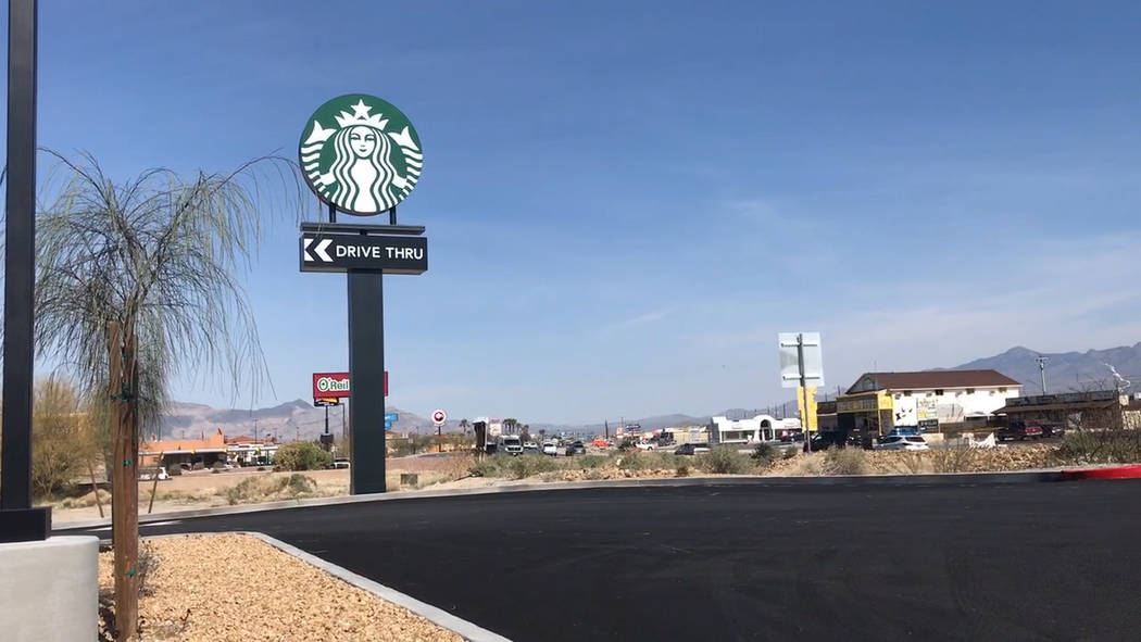 Jeffrey Meehan/Pahrump Valley Times Pahrump's first drive-thru Starbucks location in Pahrump debuted on March 25, 2019. Motorists made their way through the drive-thru line and some took to settin ...