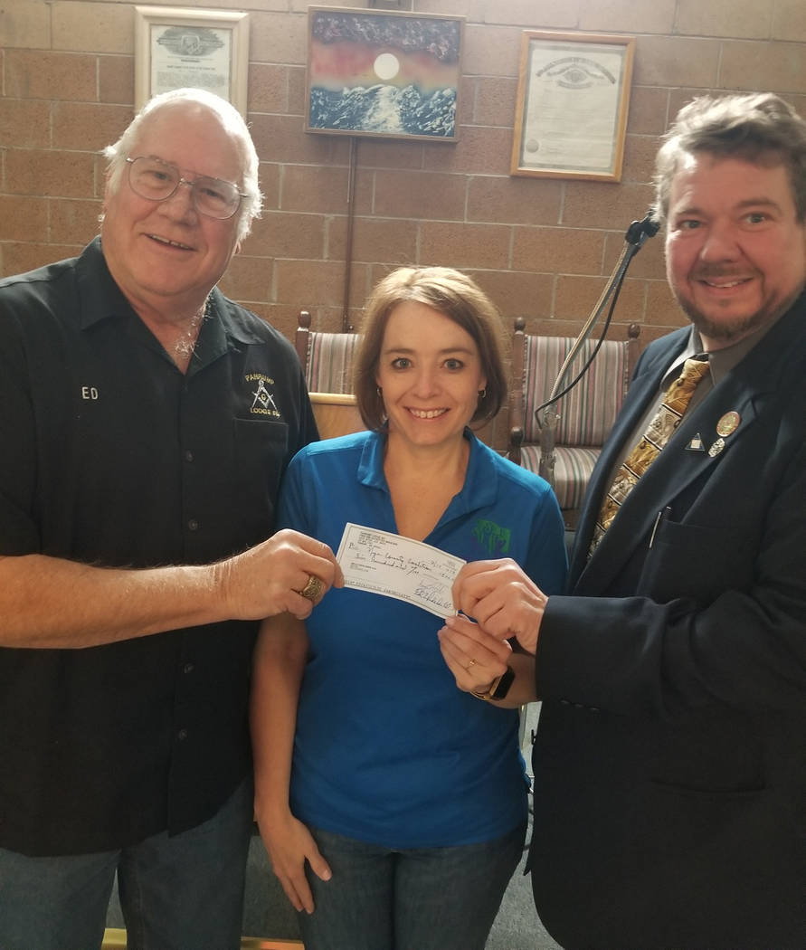 Special to the Pahrump Valley Times The Pahrump Mason Lodge 54 donated a $500 check in support of NyE Communities Coalition's 11th annual Hope Run/Walk event. Pictured from left to right is Lodge ...