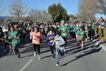 Horace Langford Jr./Pahrump Valley Times Participants in the 2018 HOPE Run/Walk a pictured making a mad dash from the starting line in this file photo. This year's event is set for March 30.