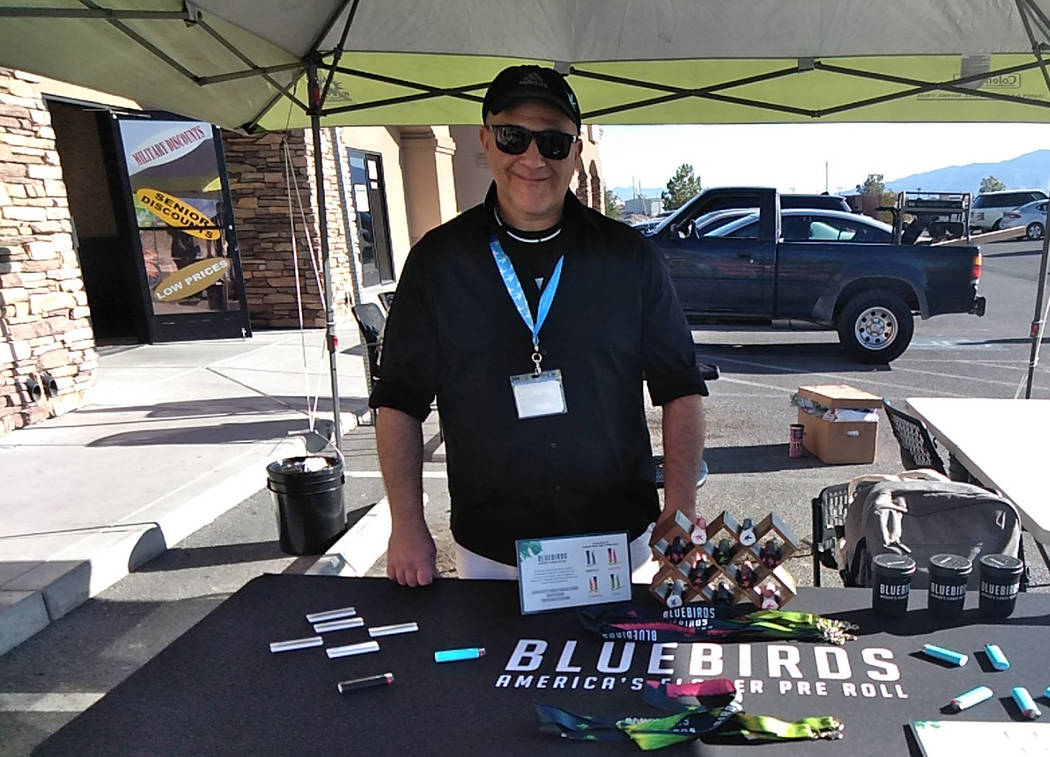 Selwyn Harris/Pahrump Valley Times Todd Lenett, a brand ambassador for Deep Roots Harvest out of Mesquite, Nv., was offering pre-rolled marijuana joints, dubbed “Bluebirds” at his booth. Lenet ...