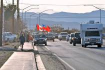 Horace Langford Jr./Pahrump Valley Times A runner with the Women's Royal Canadian Mounted Police is shown running in the Pahrump area on Saturday along Nevada Highway 372 during the Baker to Vega ...