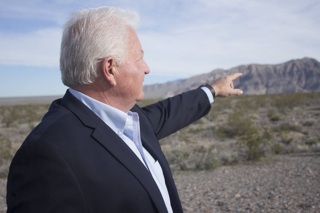 Jeffrey Meehan/Pahrump Valley Times Tim Burke points at the future site of where his grape vine ...