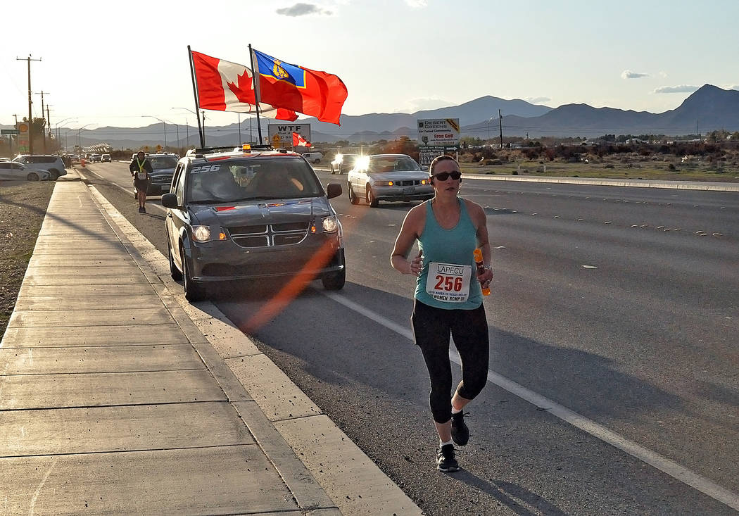 Horace Langford Jr./Pahrump Valley Times A runner representing the Royal Canadian Mounted Polic ...