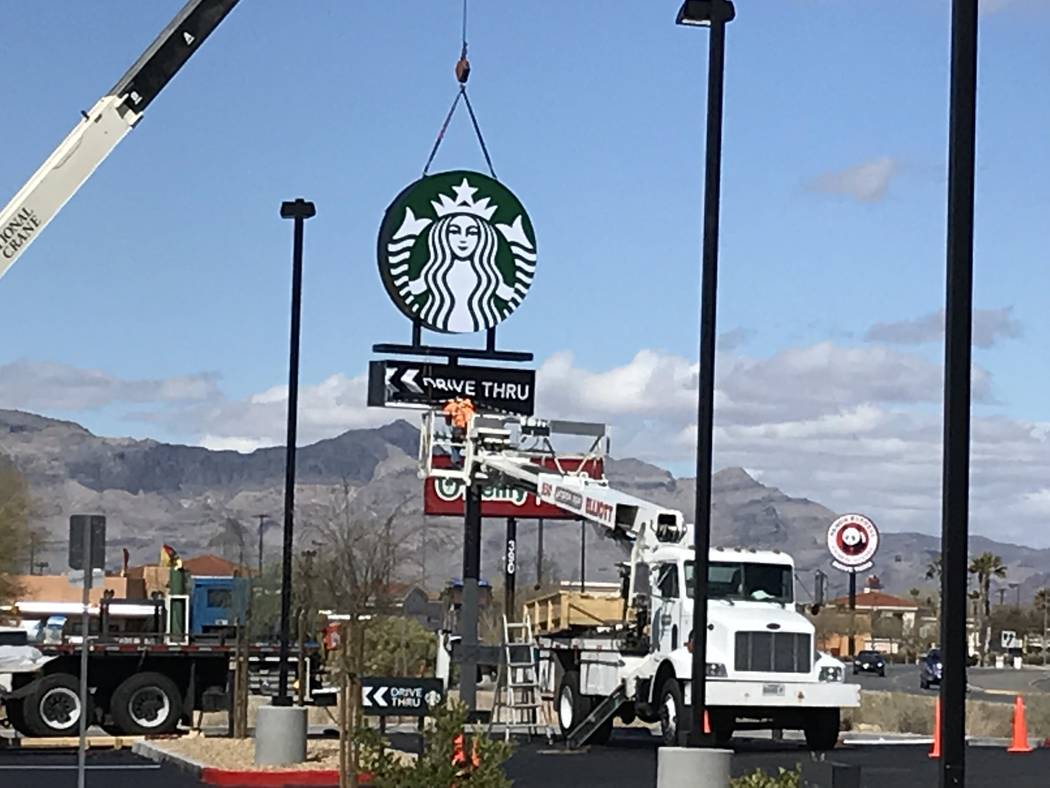 Terri Meehan/Special to the Pahrump Valley Times A sign was raised at the new Starbucks locatio ...