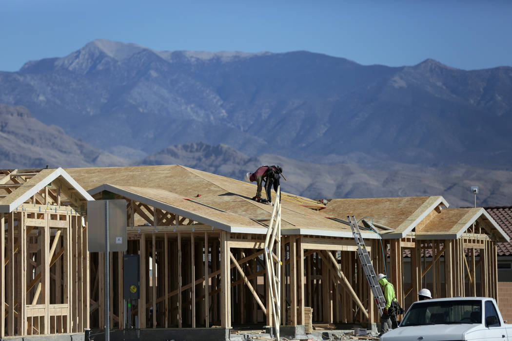 Michael Quine/Las Vegas Review-Journal.com @Vegas88s Construction crews work to complete homes ...