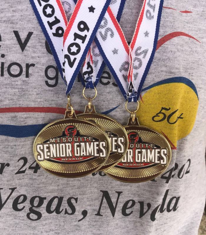 Tom Rysinski/Pahrump Valley Times Pahrump resident Marvin Caperton shows off the medals he won ...