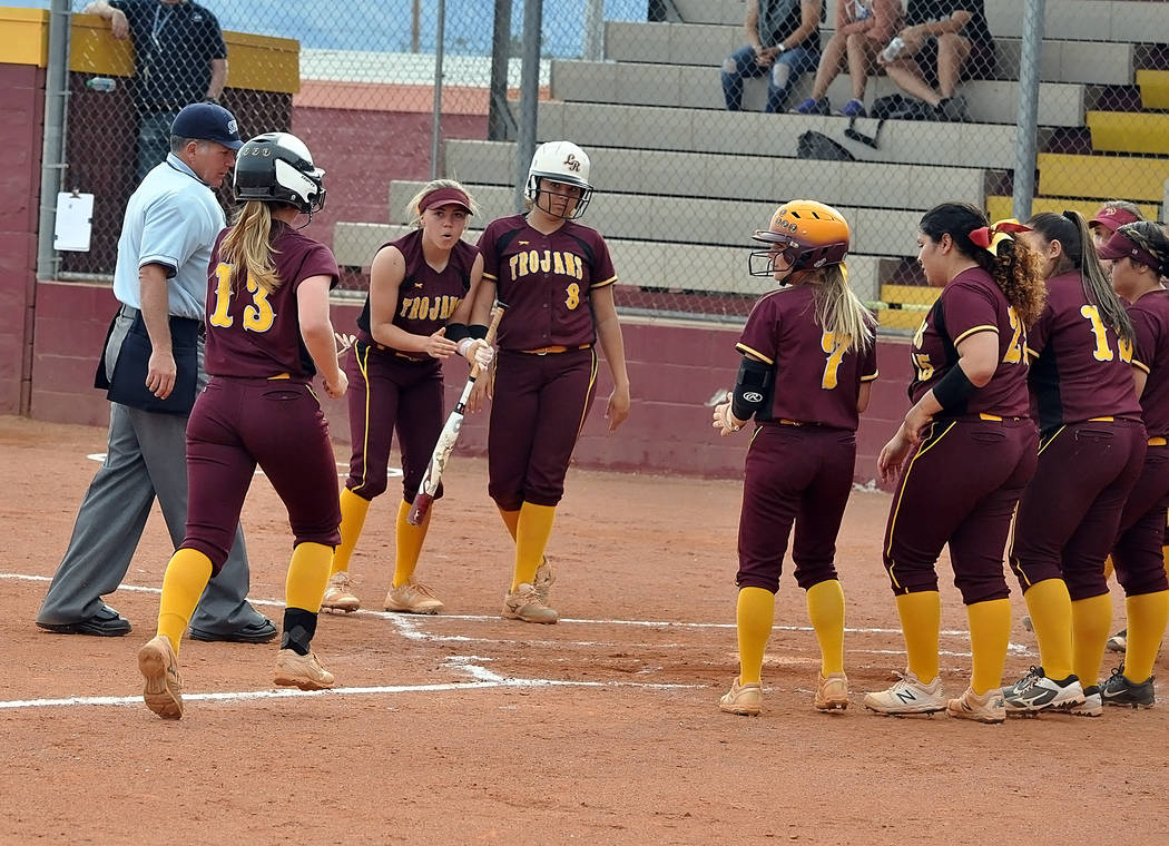 Horace Langford Jr./Pahrump Valley Times Jackie Stobbe is greeted by teammates at home plate af ...