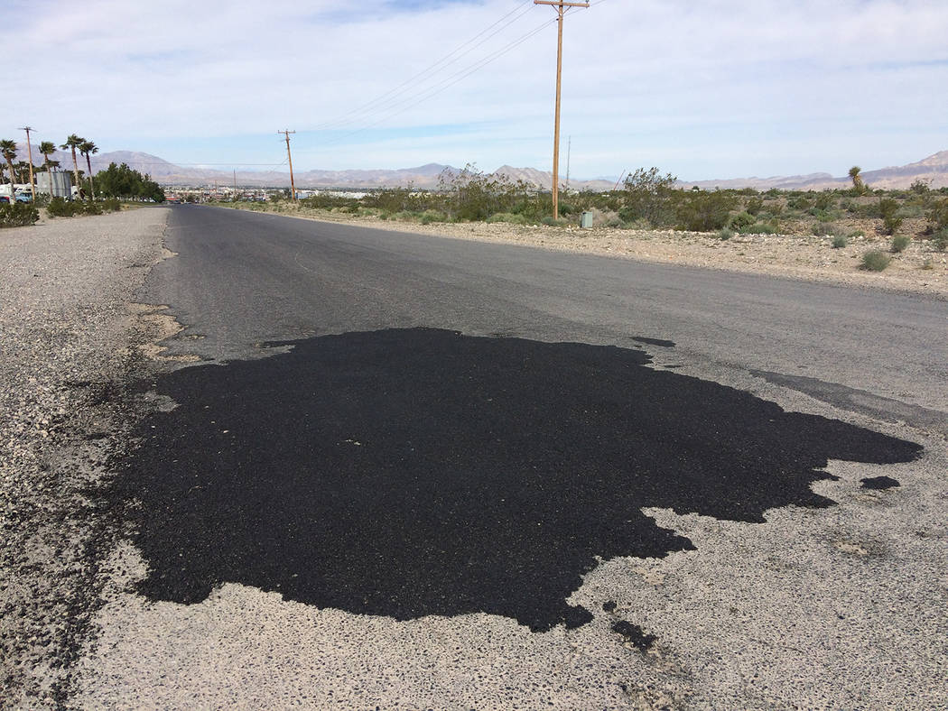 Robin Hebrock/Pahrump Valley Times Large swathes of E. Charleston Park Avenue were in need of e ...