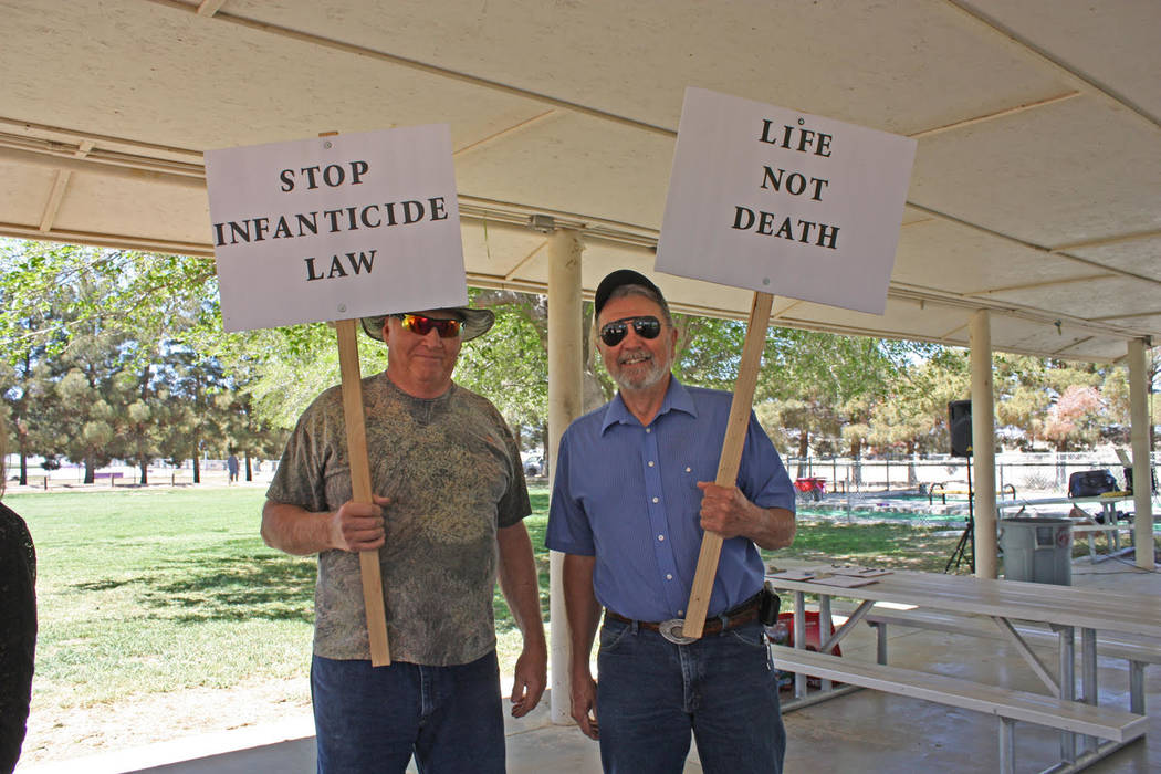 Robin Hebrock/Pahrump Valley Times Signs proclaiming a stance against abortion were hoisted by ...