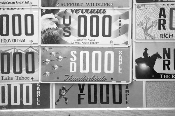 Specialty license plates decorate the wall at the DMV, 2701 E. Sahara Ave., in Las Vegas Tuesda ...