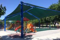 Robin Hebrock/Pahrump Valley Times New shade structures grace the playground at Petrack Park. T ...