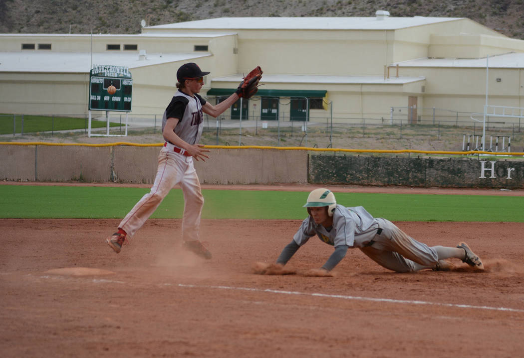 Jo Eason/Special to the Pahrump Valley Times Beatty senior Jacob Henry slides into third base a ...