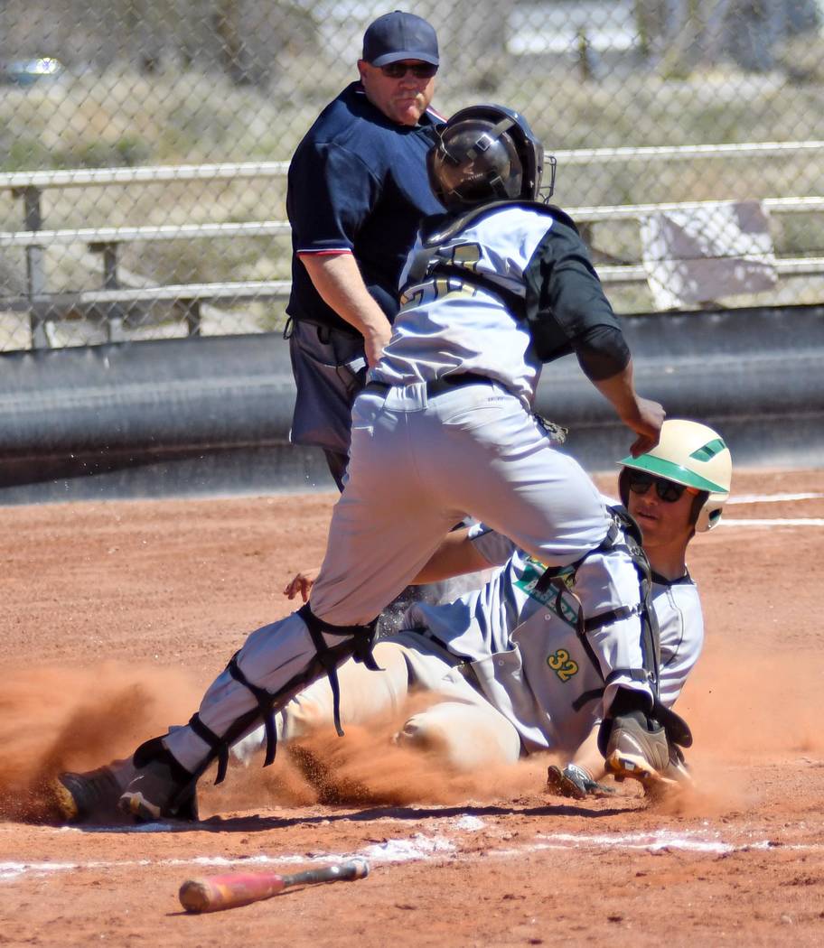 Richard Stephens/Special to the Pahrump Valley Times Beatty's Austin McKenzie slides safely int ...