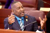 Assemblyman Tyrone Thompson, D-North Las Vegas, prepares for a joint meeting of the Senate Fina ...