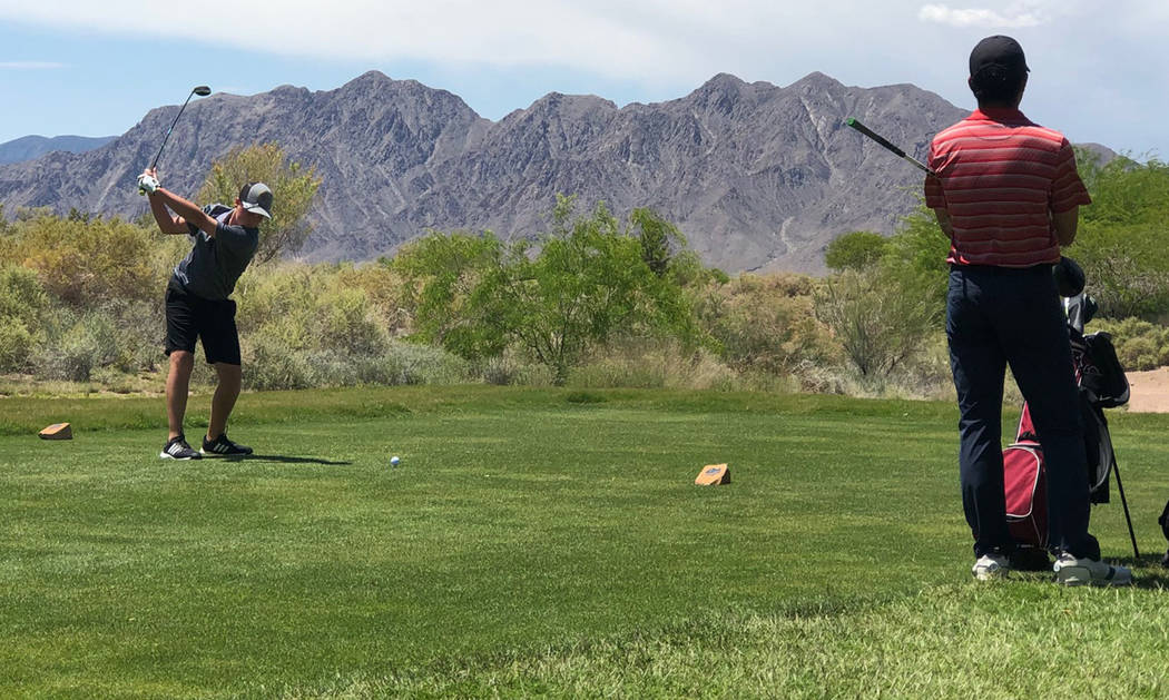 Tom Rysinski/Pahrump Valley Times Kasen Moore of Pahrump Valley opens his second round at the C ...