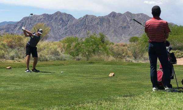 Tom Rysinski/Pahrump Valley Times Kasen Moore of Pahrump Valley opens his second round at the C ...