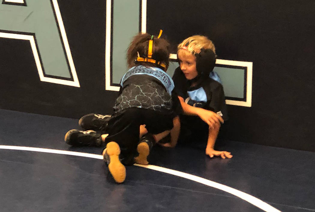 Tom Rysinski/Pahrump Valley Times Suri Yoffee, 7, of Pahrump wrestles during practice at Centen ...