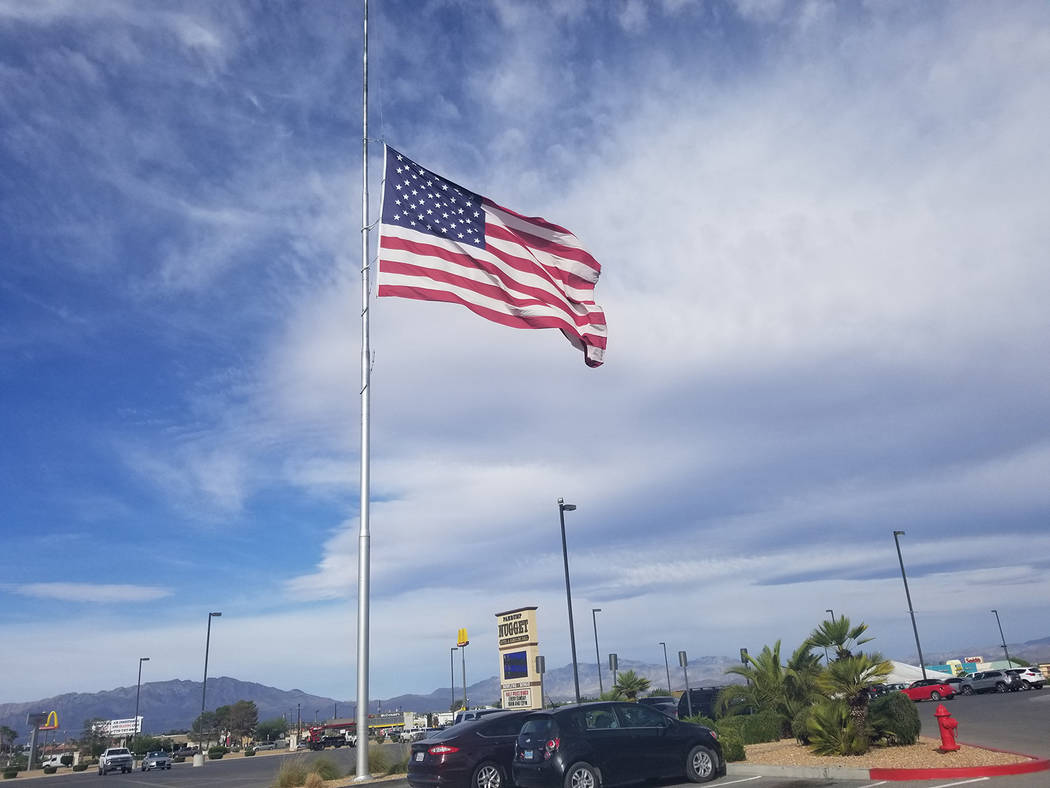 David Jacobs/Pahrump Valley Times An American flag is shown flying at half-staff in Pahrump on ...