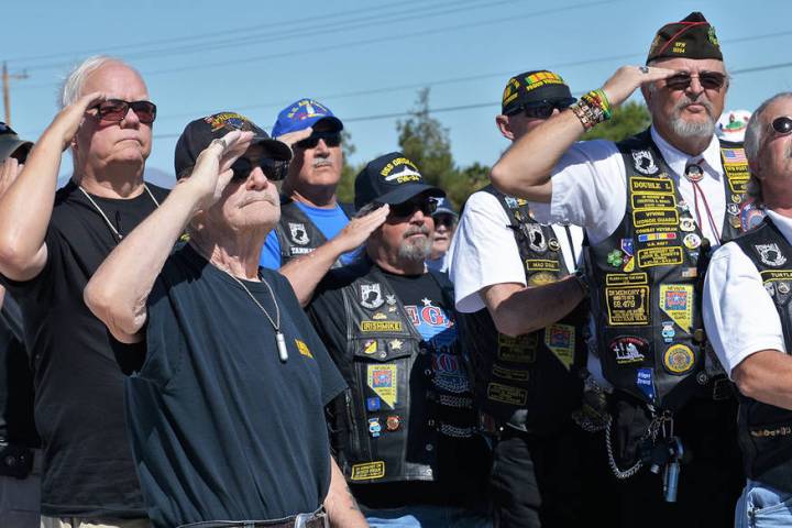 Selwyn Harris/Pahrump Valley Times This file photo shows local veterans saluting the flag durin ...