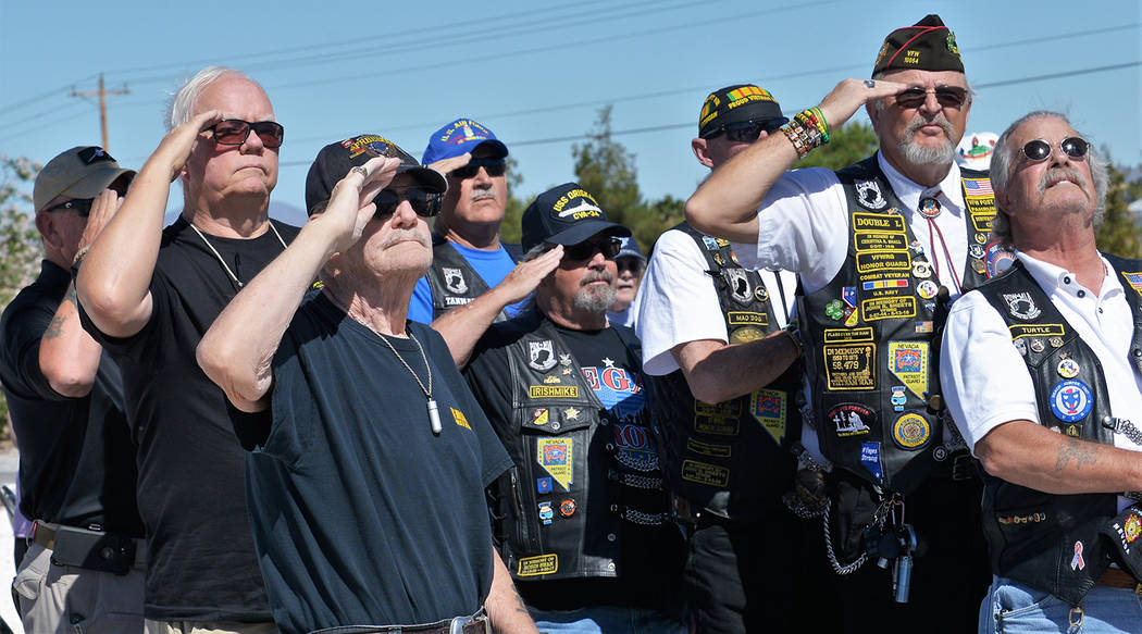 Selwyn Harris/Pahrump Valley Times This file photo shows local veterans saluting the flag durin ...