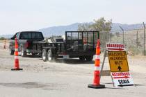 Robin Hebrock/Pahrump Valley Times A bright yellow sign directs vehicles in the proper directio ...
