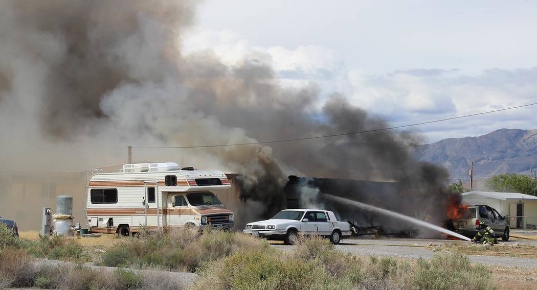 Charles Hoover/Special to the Pahrump Valley Times Upon arrival, fire crews began what’s know ...