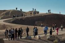 Death Valley National Park photo This photo shows visitors to Zabriskie Point in Death Valley N ...