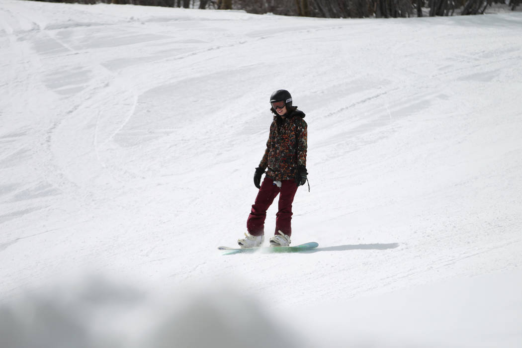 A person snowboards down a hill at Lee Canyon in Las Vegas, Friday, March 8, 2019. Erik Verduzc ...