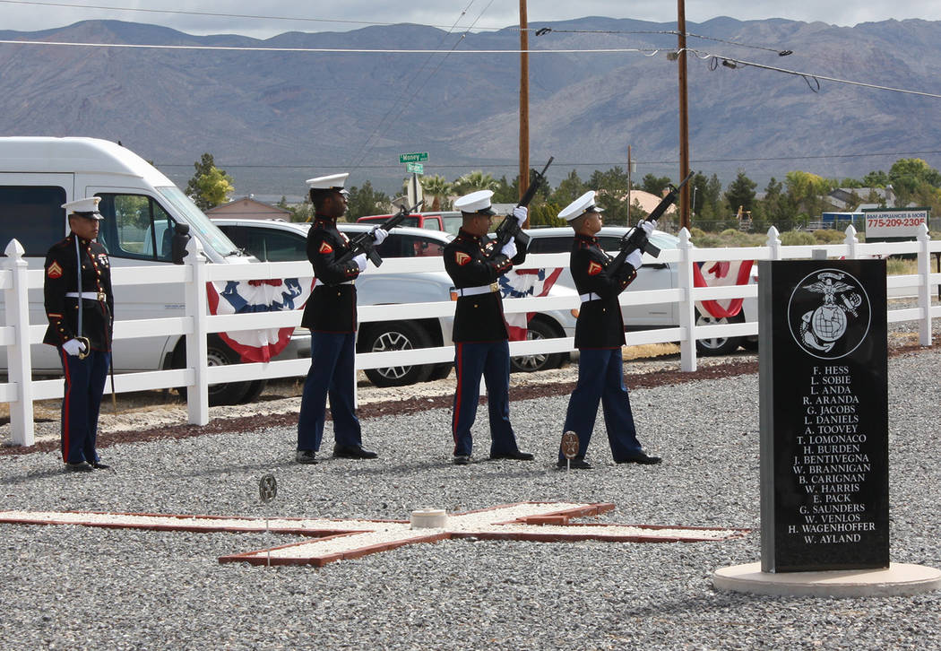 Robin Hebrock/Pahrump Valley Times A rifle salute executed by Marines from the Inspector-Instru ...