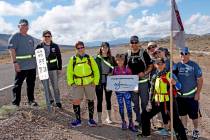 Richard Stephens/Special to the Pahrump Valley Times The group gathered at mile marker 73 for a ...
