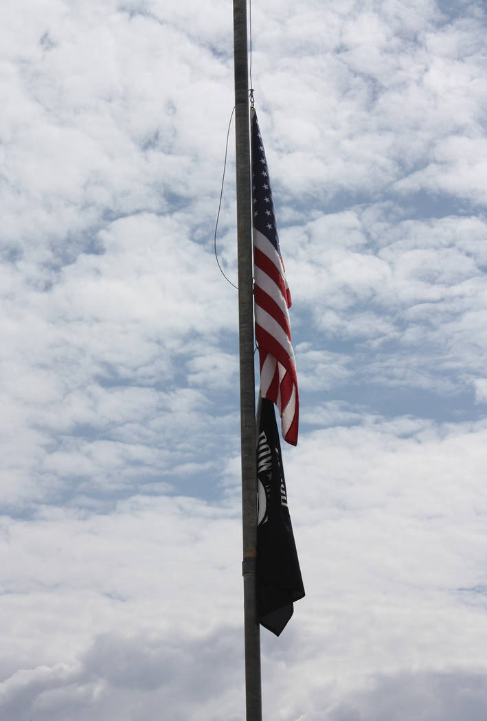 Robin Hebrock/Pahrump Valley Times The American flag and POW/MIA flag fly over the Veterans of ...