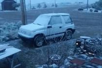 Teresa Doreen/Special to the Times-Bonanza Snow dusts an SUV in the Goldfield area on May 26 as ...