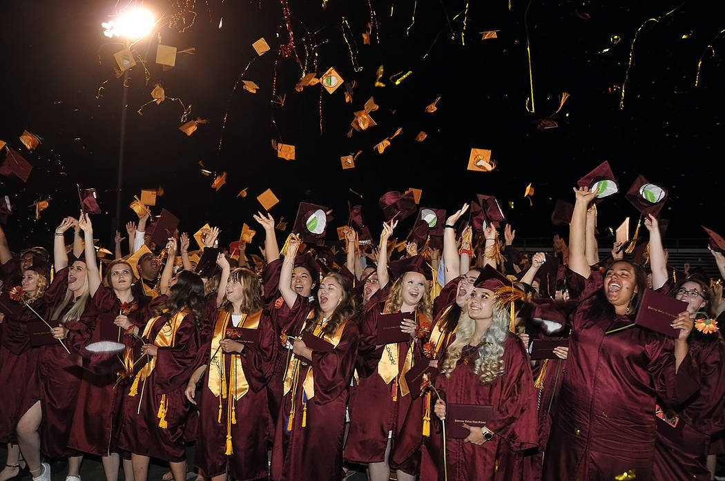 Horace Langford Jr./Pahrump Valley Times The Class of 2019 at Pahrump Valley High School toss ...