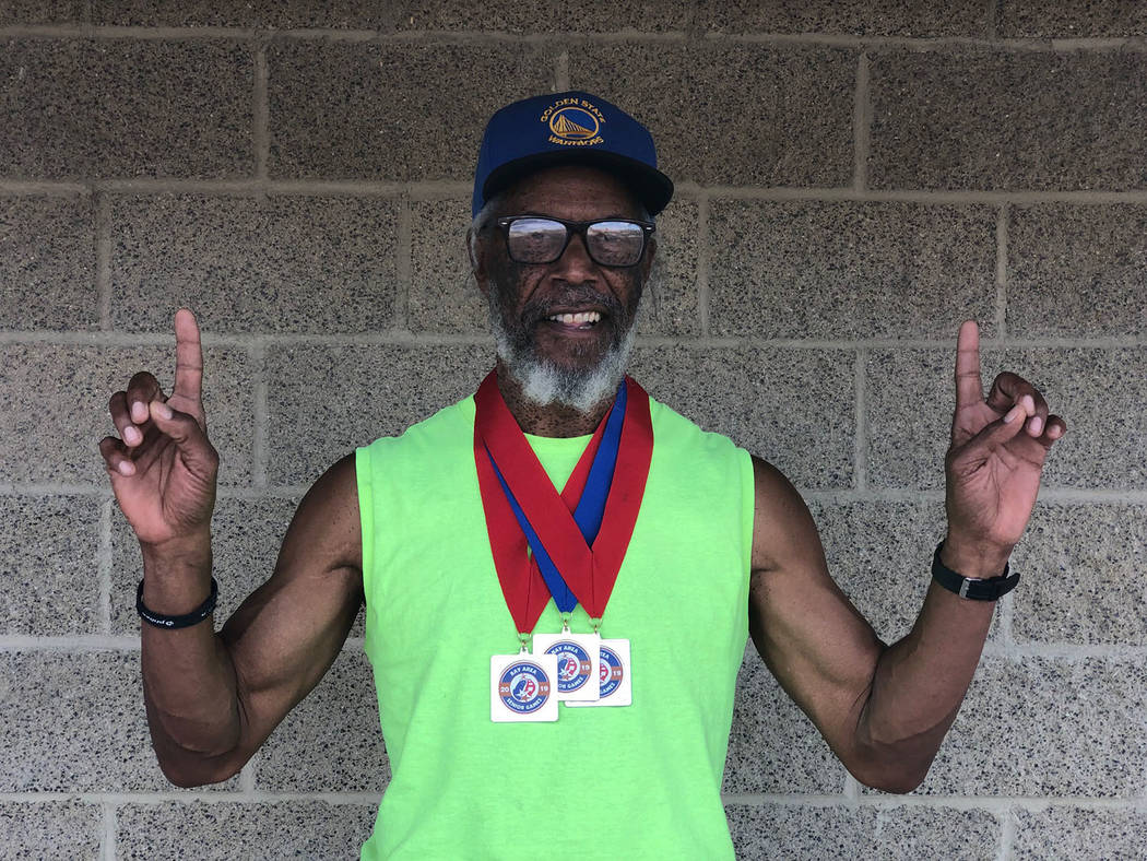 Tom Rysinski/Pahrump Valley Times Pahrump resident Marvin Caperton with the three medals he won ...