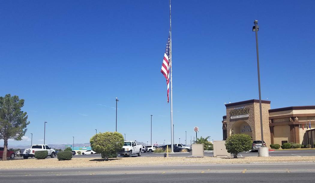 David Jacobs/Pahrump Valley Times The American flag stands at half staff in Pahrump as shown in ...
