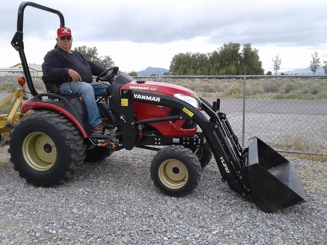 Special to the Pahrump Valley Times Clarence Wenham sits aboard his brand new Yanmar tractor, w ...