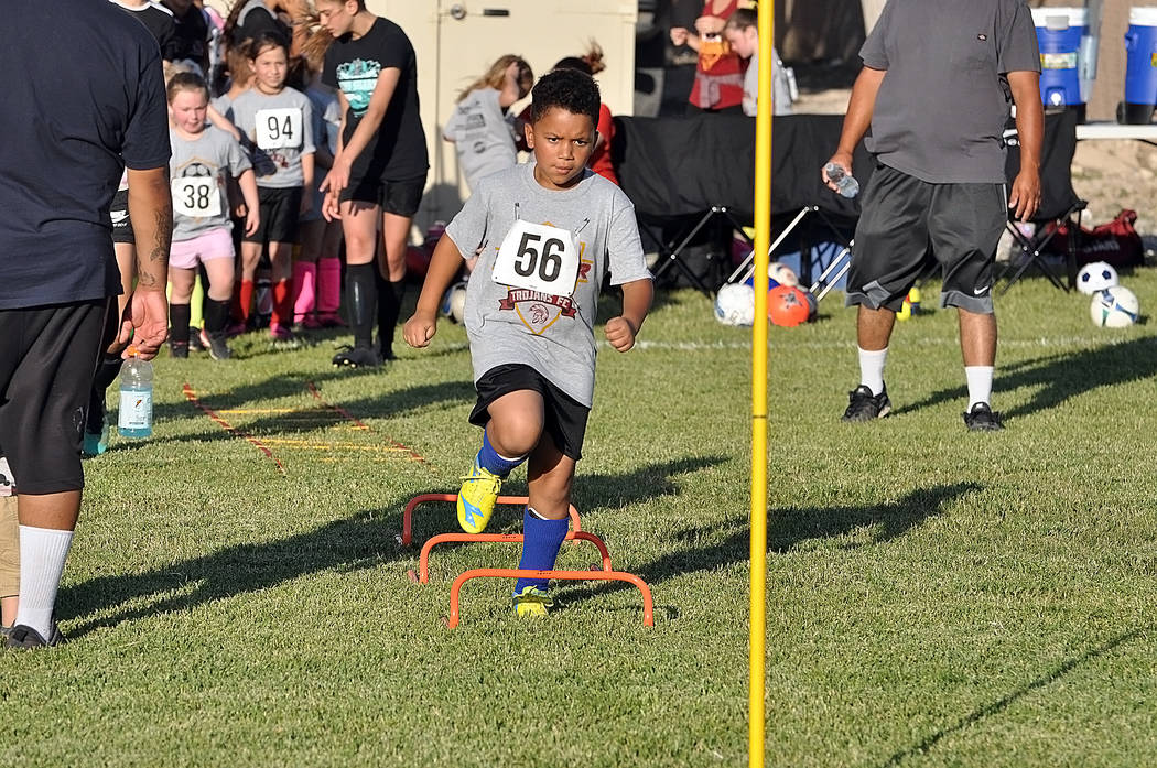 Horace Langford Jr./Pahrump Valley Times A determined young player runs a drill during the Juni ...