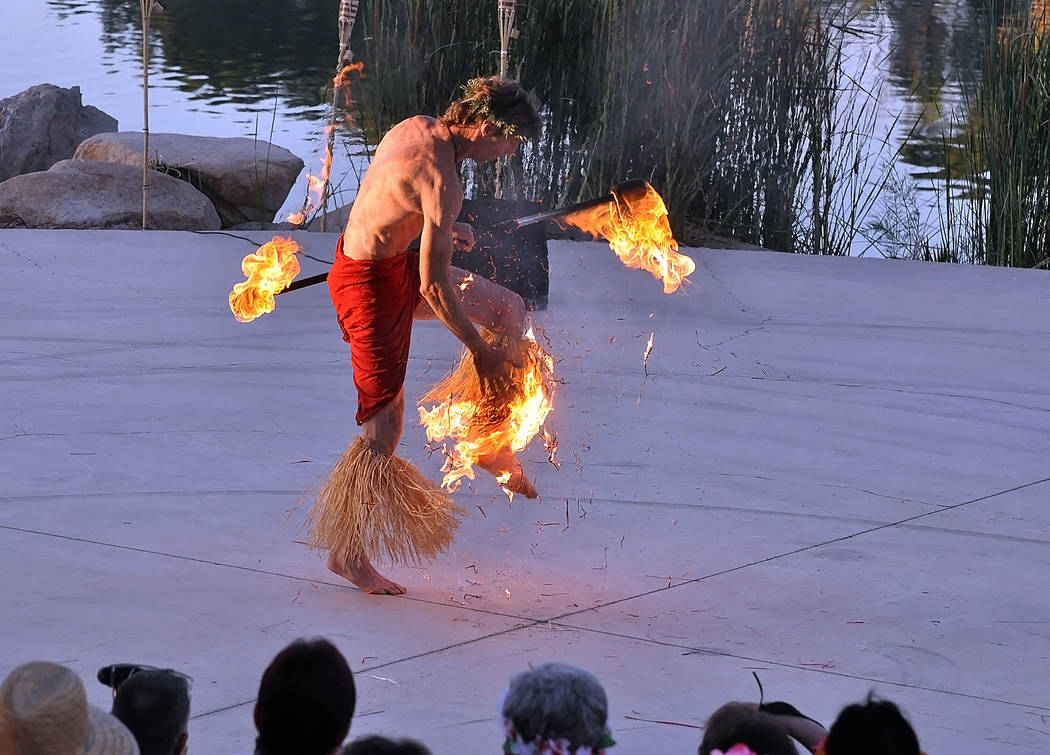 Horace Langford Jr./Pahrump Valley Times The fire fire dancer aware that his leg had caught fi ...
