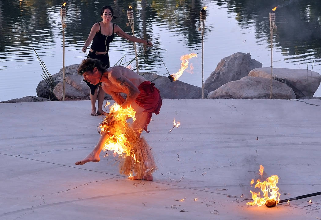 Horace Langford Jr./Pahrump Valley Times A fire dancer with his leg on fire at a luau in Pahru ...