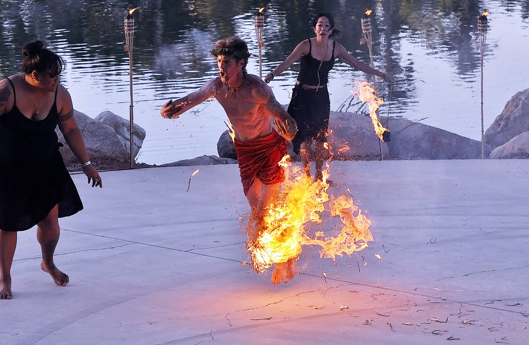 Horace Langford Jr./Pahrump Valley Times A fire dancer with his leg on fire at a luau in Pahru ...